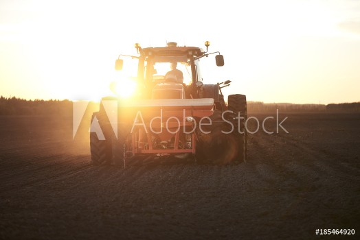 Picture of Red tractor plow field